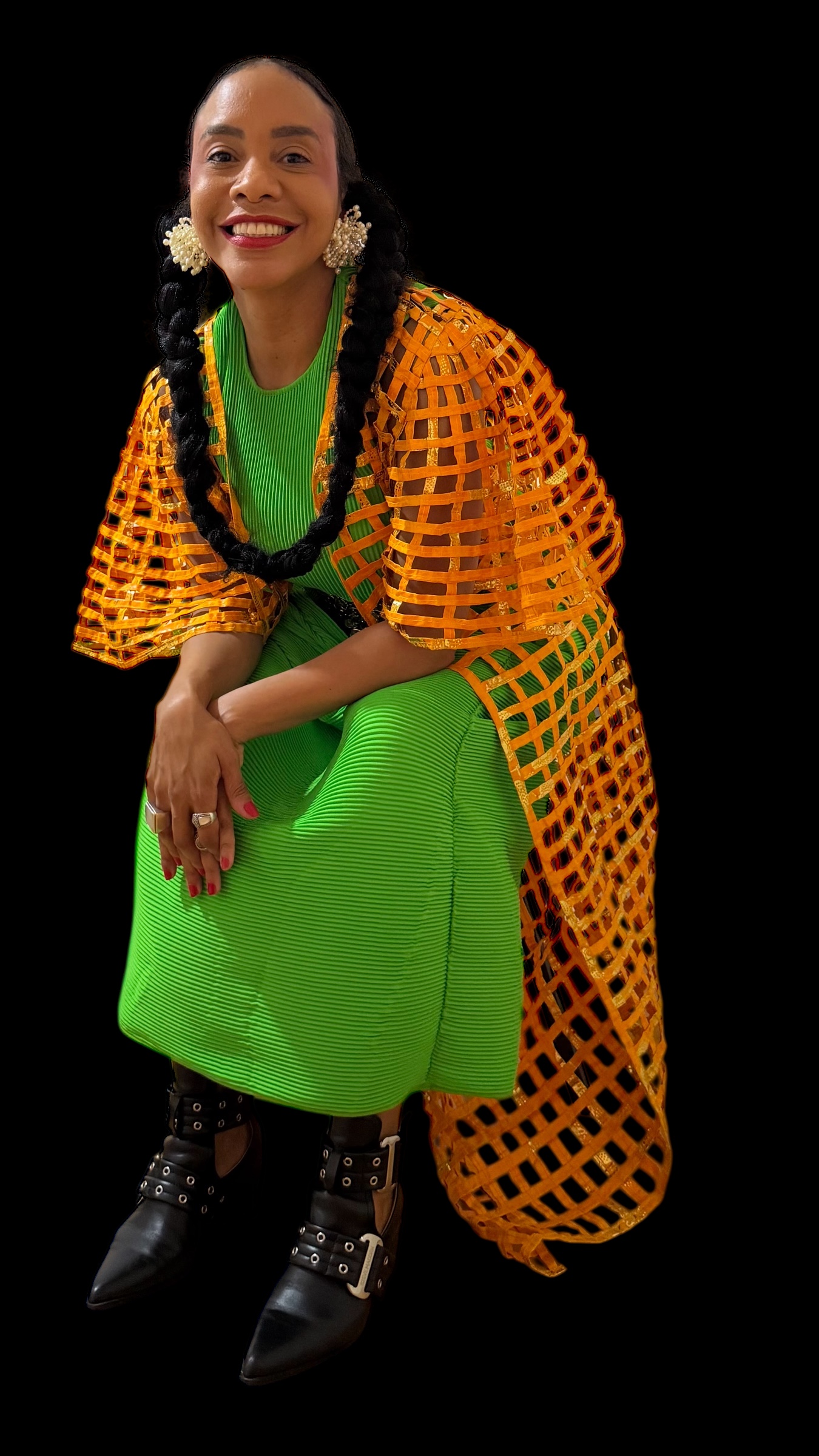 AnaQomSoul in an orange mesh jacket