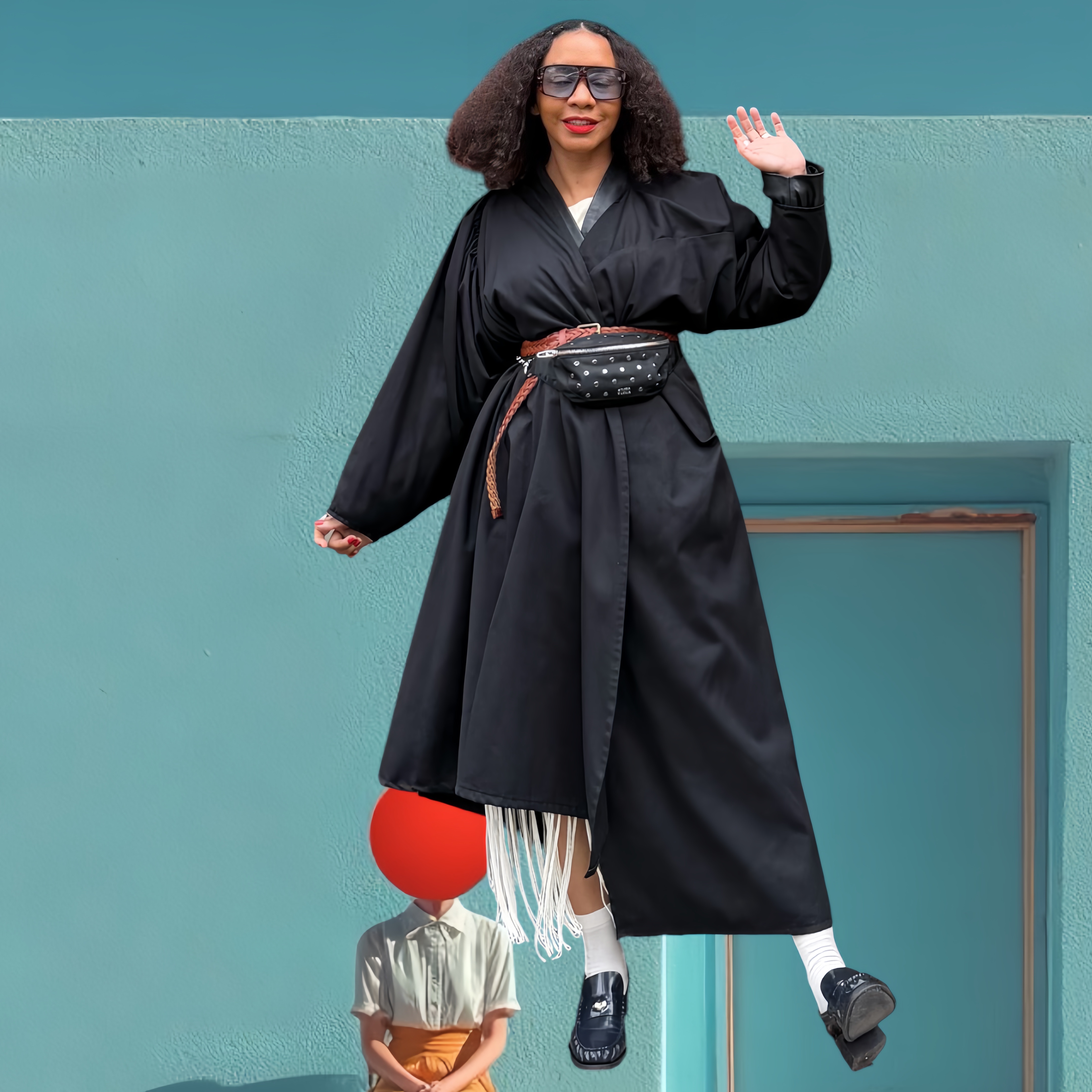 AnaQomSoul jumping, teal wall